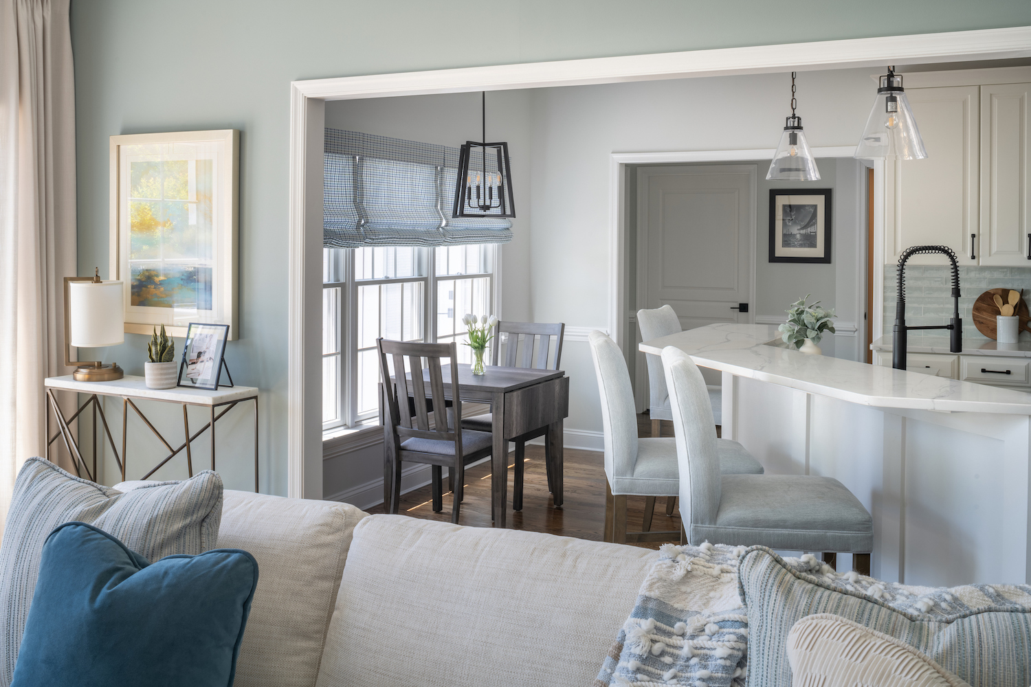 The beautiful living room leads into a custom kitchen.